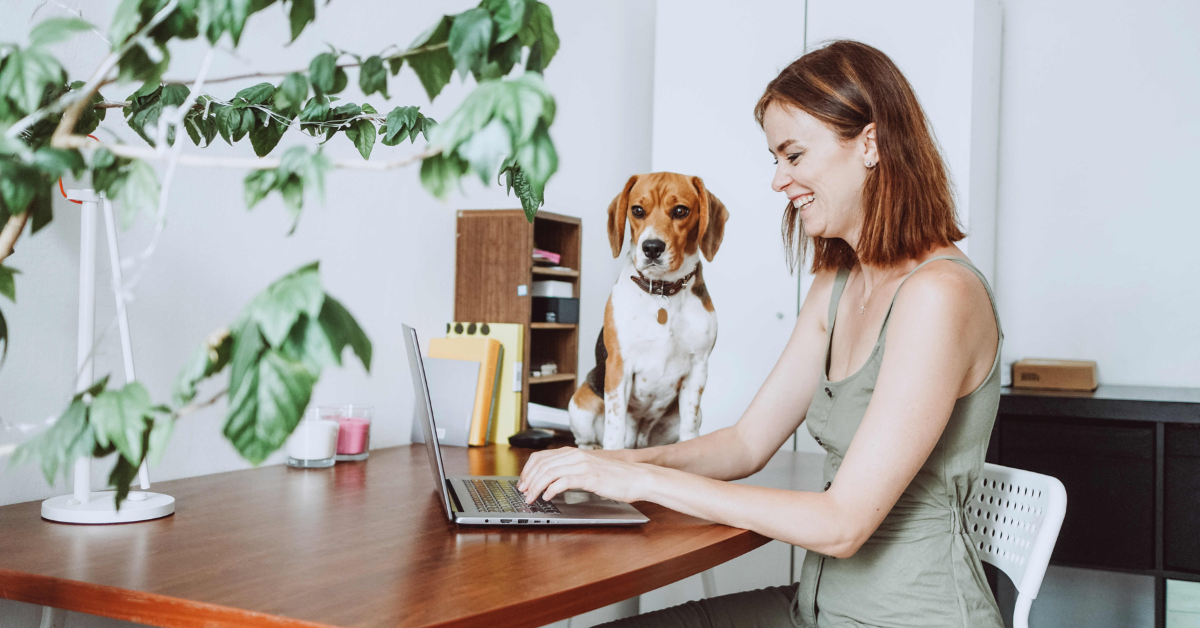 Remote employee communicating with colleagues on laptop.