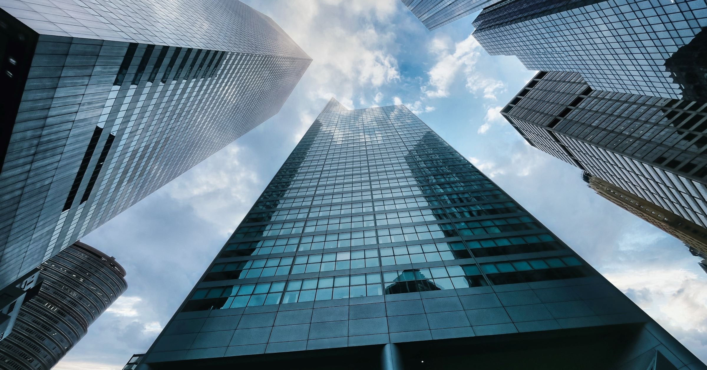 tall buildings view looking up offices campus visitors